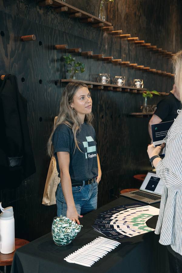 A sponsor booth conversation at WAVE-Seattle